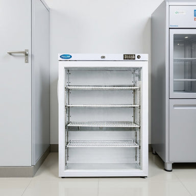 Nuline MLS125GP Static Refrigerator with Glass Door Closed Standing Against Laboratory Wall Front View