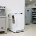 Nuline ML125 Schedule 8 Drug Refrigerator Solid Door Closed Standing on Laboratory Floor Against Wall Angled Right Front View