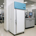 Nuline NHFTS600 Top Mounted Spark Safe Freezer with Solid Door Closed Standing Against Laboratory Wall Angled Right Front View