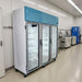 Nuline NLM1614-3 Laboratory Refrigerator with Glass Doors Closed Standing Against Laboratory Wall Angled Right Front View