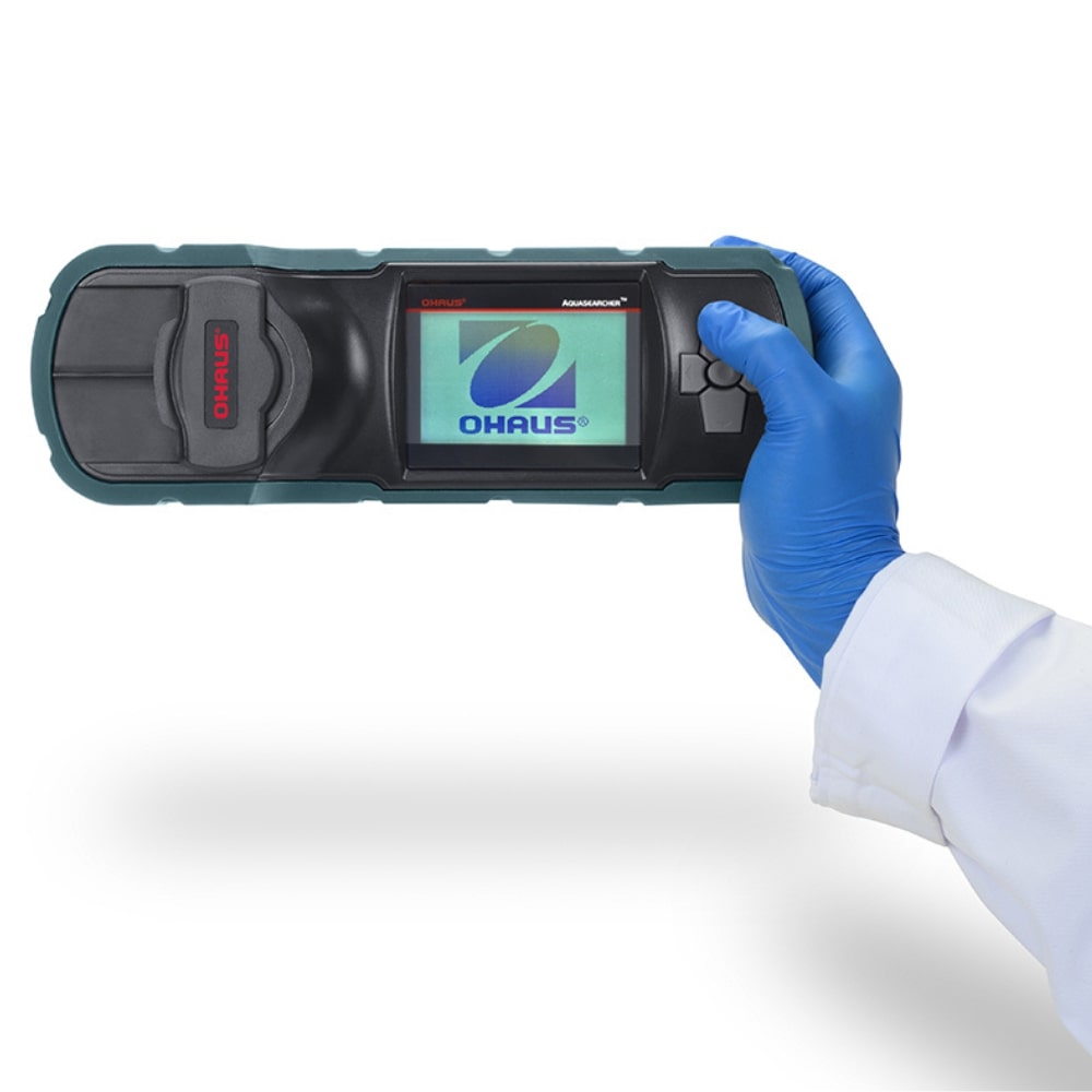 Ohaus Aquasearcher AP50MM Colorimeter being used by Hand Pressing Panel Button Top View